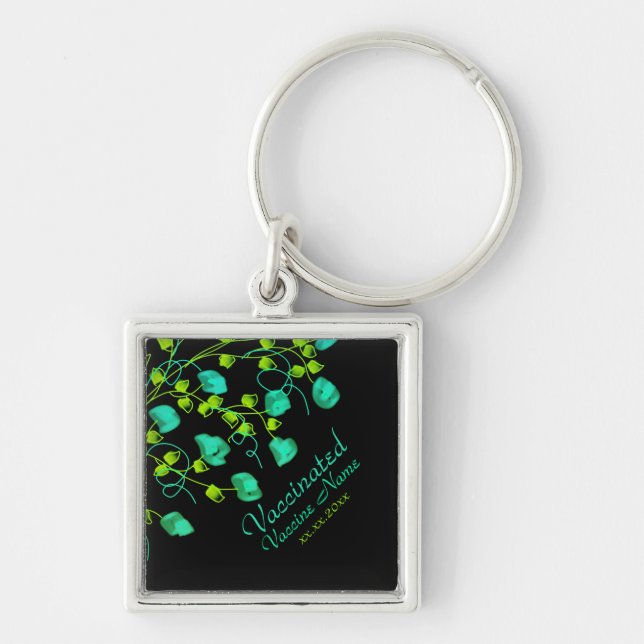 Bright teal and lime green floral keychain (Front)