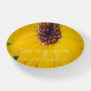 Bright yellow flower after rain paperweight