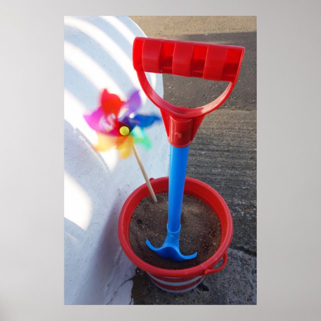 Brightly Colored Beach Toys Poster (Front)