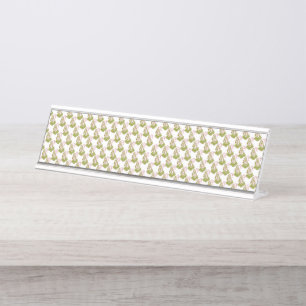Brightly colored wrapping paper with a festive pat desk name plate