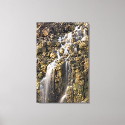 Brine falls from volcanic rock drop off canvas print