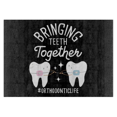 Bringing Teeth Together _ Orthodontist  Cutting Board
