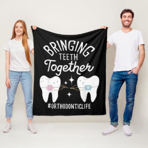 Bringing Teeth Together - Orthodontist  Fleece Blanket