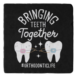 Bringing Teeth Together - Orthodontist  Trivet