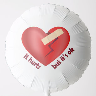 Broken heart healed with patch and life quote balloon