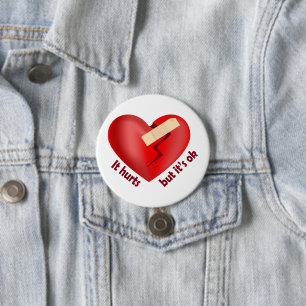 Broken heart healed with patch and life quote button