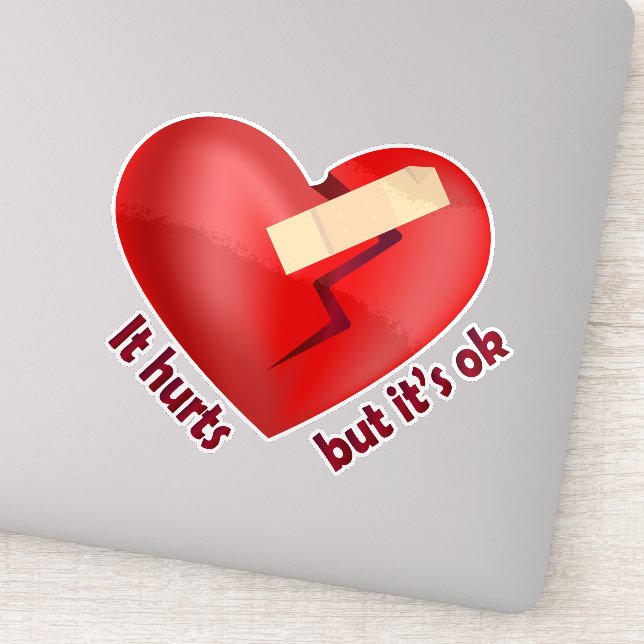 Broken heart healed with patch and life quote sticker (Detail)