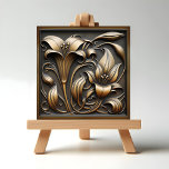 Bronze Calla Lily Ceramic Tile<br><div class="desc">A bronze bas-relief ceramic tile featuring calla lilies. The warm bronze finish catches the light in subtle ways. With elegant, trumpet-shaped blooms gently curving upwards that give you a sense of depth and texture. The long, slender stem of the lily winds gracefully down the tile, surrounded by broad, gently curved...</div>