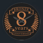 Bronze eighth wedding anniversary 8 years large clock<br><div class="desc">A design to celebrate 8 years of marriage. This design has a tan (bronze) colored laurel design on a black background. Bronze is the traditional gift for this occasion, USA. The text reads BRONZE 8 years anniversary. A romantic design to celebrate your 8th year of marriage. If you would like...</div>