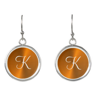 Bronze shiny faux metal monogram earrings