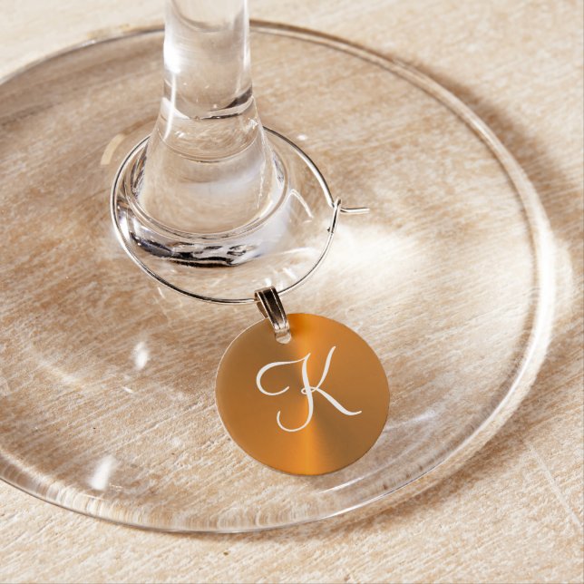 Bronze shiny faux metal monogram wine charm (In Situ)