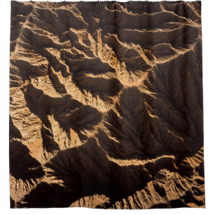 Brown and black sand in the morning shower curtain