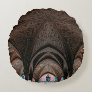 Brown and black wooden building interior round pillow