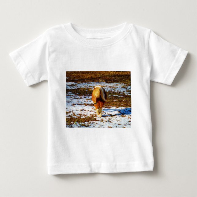 Brown and cream miniature horse in the snow. baby T-Shirt (Front)