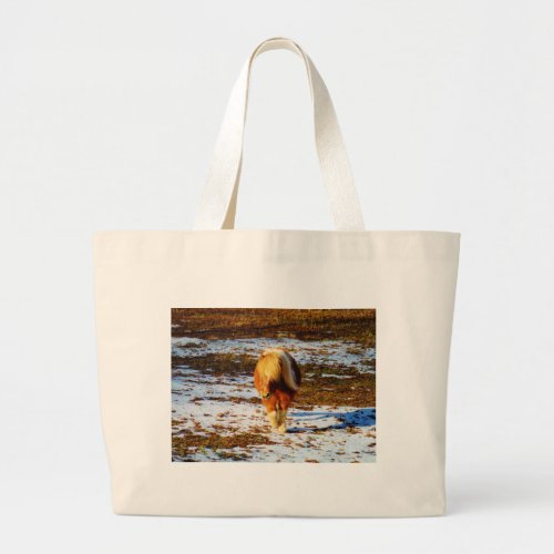 Brown and cream miniature horse in the snow large tote bag