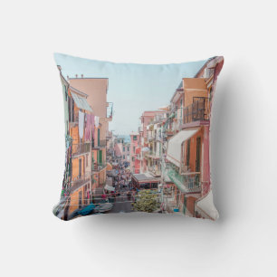 BROWN AND WHITE CONCRETE BUILDINGS THROW PILLOW