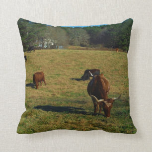 Brown and white longhorn cattle throw pillow