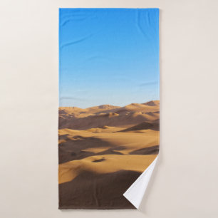 BROWN AND WHITE MOUNTAINS UNDER BLUE SKY DURING DA BATH TOWEL