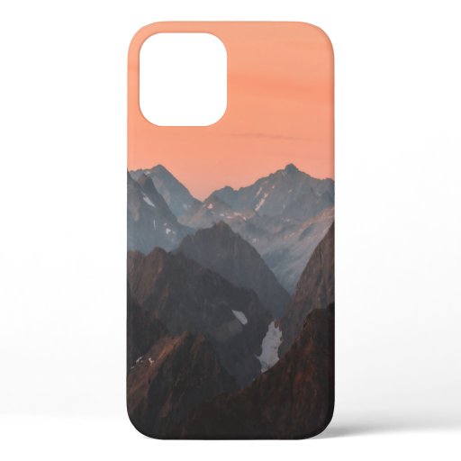 BROWN AND WHITE MOUNTAINS UNDER ORANGE SKY iPhone 12 CASE