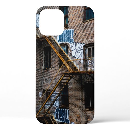 BROWN BRICK BUILDING WITH YELLOW METAL LADDER iPhone 12 CASE