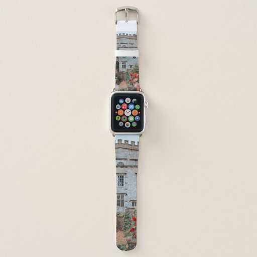 BROWN BRICKED HOUSE NEAR RED FLOWERS APPLE WATCH BAND