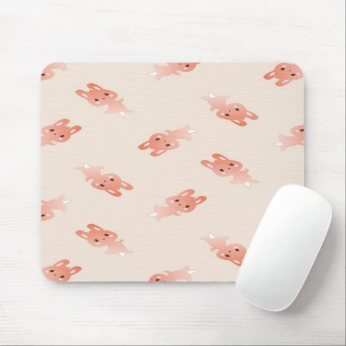 Brown bunnies on pink mouse pad
