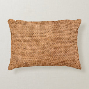Brown burlap cloth background or sack cloth accent pillow