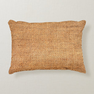 Brown burlap cloth background or sack cloth accent pillow