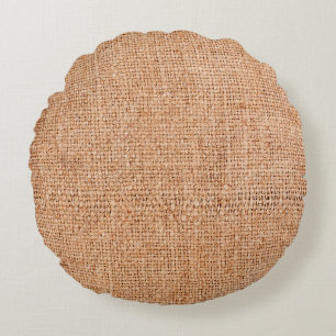 Brown burlap laying on white sheet. Abstract backg Round Pillow