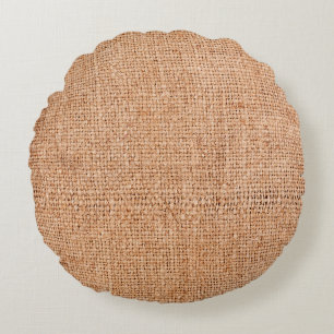 Brown burlap laying on white sheet. Abstract backg Round Pillow