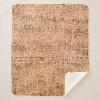 Brown burlap laying on white sheet. Abstract backg Sherpa Blanket