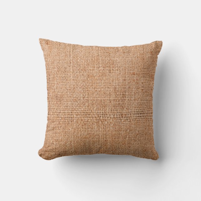Brown burlap laying on white sheet. Abstract backg Throw Pillow (Front)