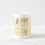 Brown Cat and  Yellow Bird by Chariklia Zarris Bone China Mug