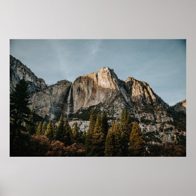 BROWN CLIFF NEAR TREES UNDER BLUE SKY POSTER (Front)
