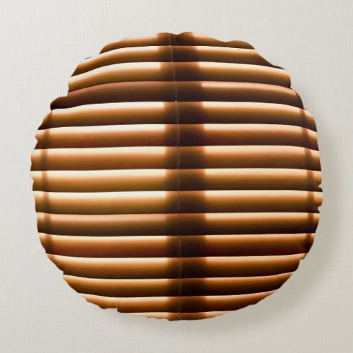 Brown closed window blinds round pillow