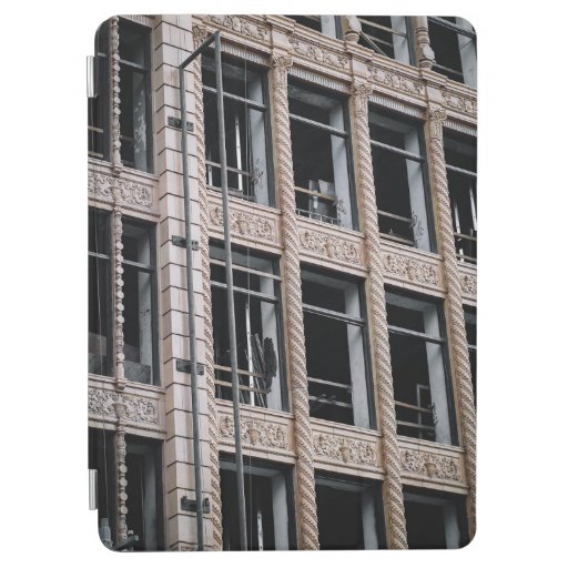 BROWN CONCRETE BUILDING WITH GLASS WINDOWS iPad AIR COVER