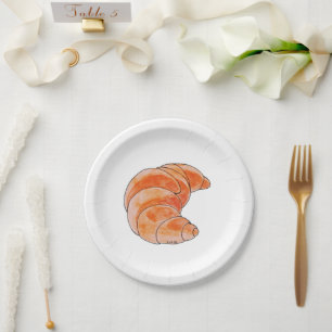 brown croissant bread paper plates