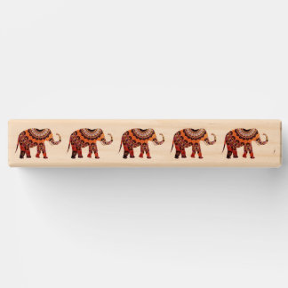 Brown Elephants Topple Tower