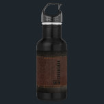 Brown Faux Leather Monogram Groomsman Gift Stainless Steel Water Bottle<br><div class="desc">Introducing our elegant and modern water bottle from our exclusive groomsmen gift collection. Featuring brown and black stitched faux leather, this water bottle is not only stylish but also durable enough to withstand even the most rugged outdoor adventures. Each water bottle features a unique monogram of the recipient's initials in...</div>