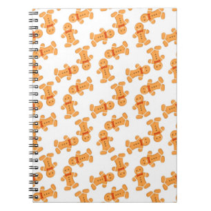 Brown gingerbread man on white notebook