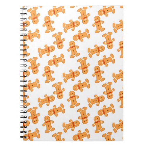 Brown gingerbread man on white notebook