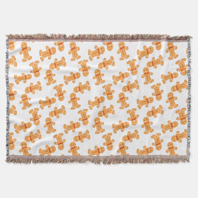 Brown gingerbread man on white throw blanket (Front)