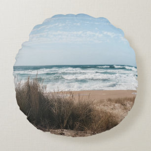 BROWN GRASS NEAR SEA UNDER BLUE SKY ROUND PILLOW
