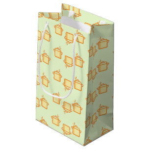Brown hot pots on green small gift bag
