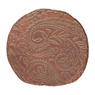 Brown leather, tooled floral pattern. pouf