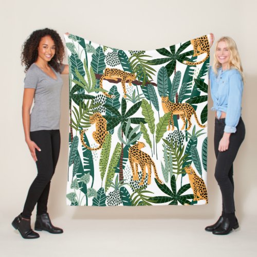 Brown leopard in tropical lush jungle leaves wrapp fleece blanket