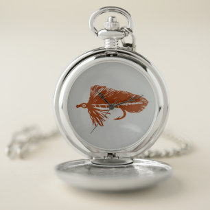 Brown matuka streamer, fly tying and fishing pocket watch