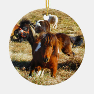 Brown miniature horses running ceramic ornament