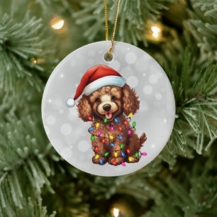 Brown Poodle Wrapped in Christmas Lights Ceramic Ornament