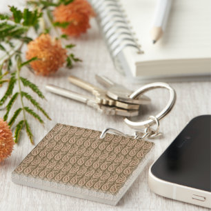 Brown rug featuring a detailed motif pattern with  keychain